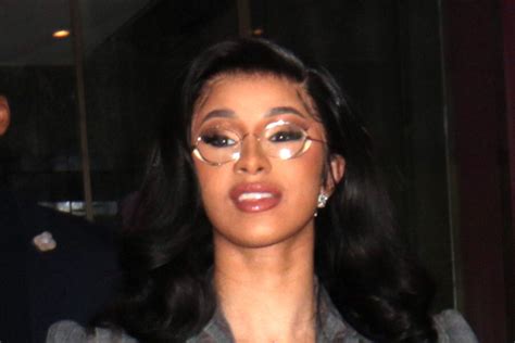 Cardi B’s Dior Crop Top, Invisible Leggings & Denim Sandals 